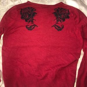 Cardigan with glitter roses on back